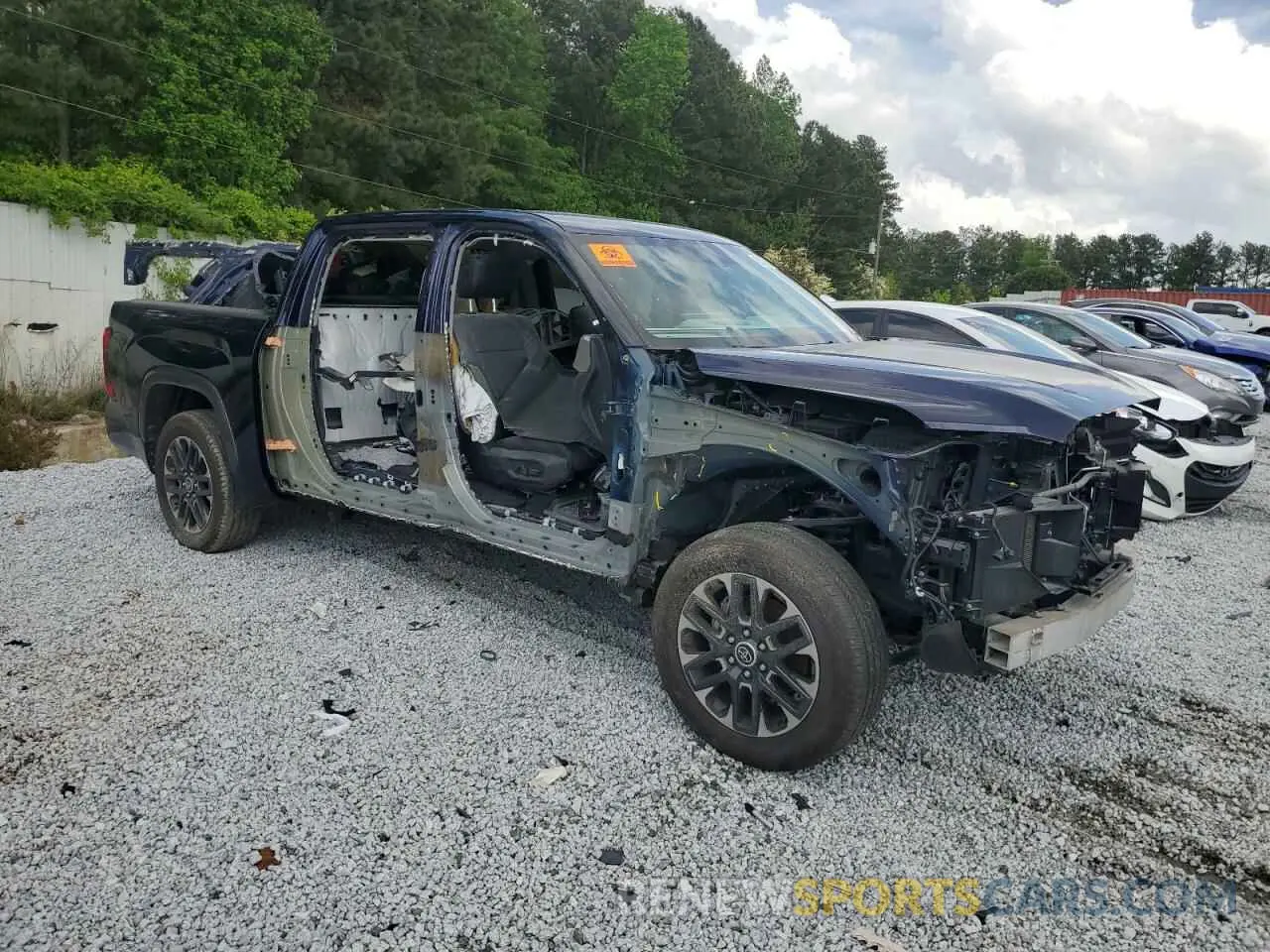 4 fotografías del automóvil dañado 5TFJA5DB4PX077353 TOYOTA TUNDRA 2023