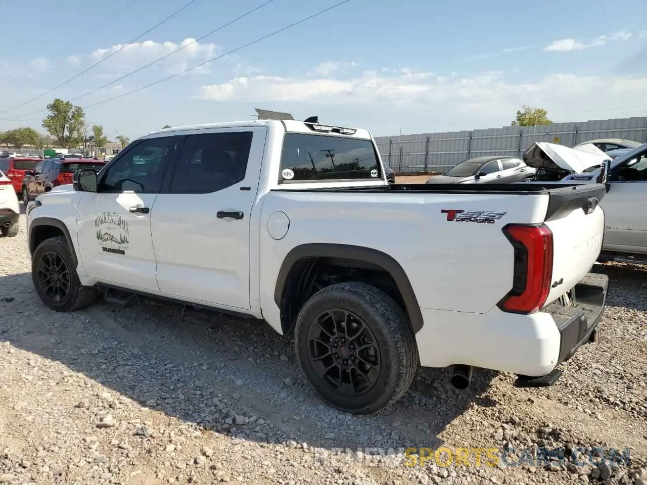 2 fotografías del automóvil dañado 5TFLA5DB3PX075781 TOYOTA TUNDRA 2023