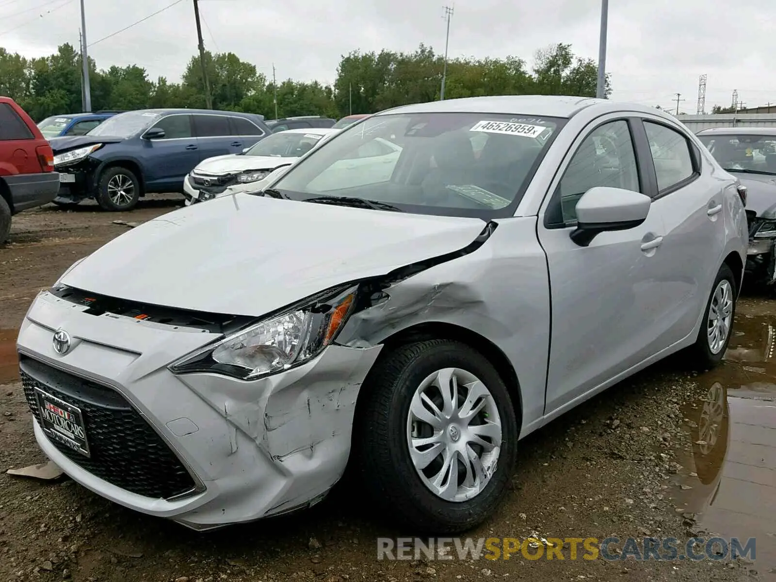 2 fotografías del automóvil dañado 3MYDLBYV8KY510076 TOYOTA YARIS 2019