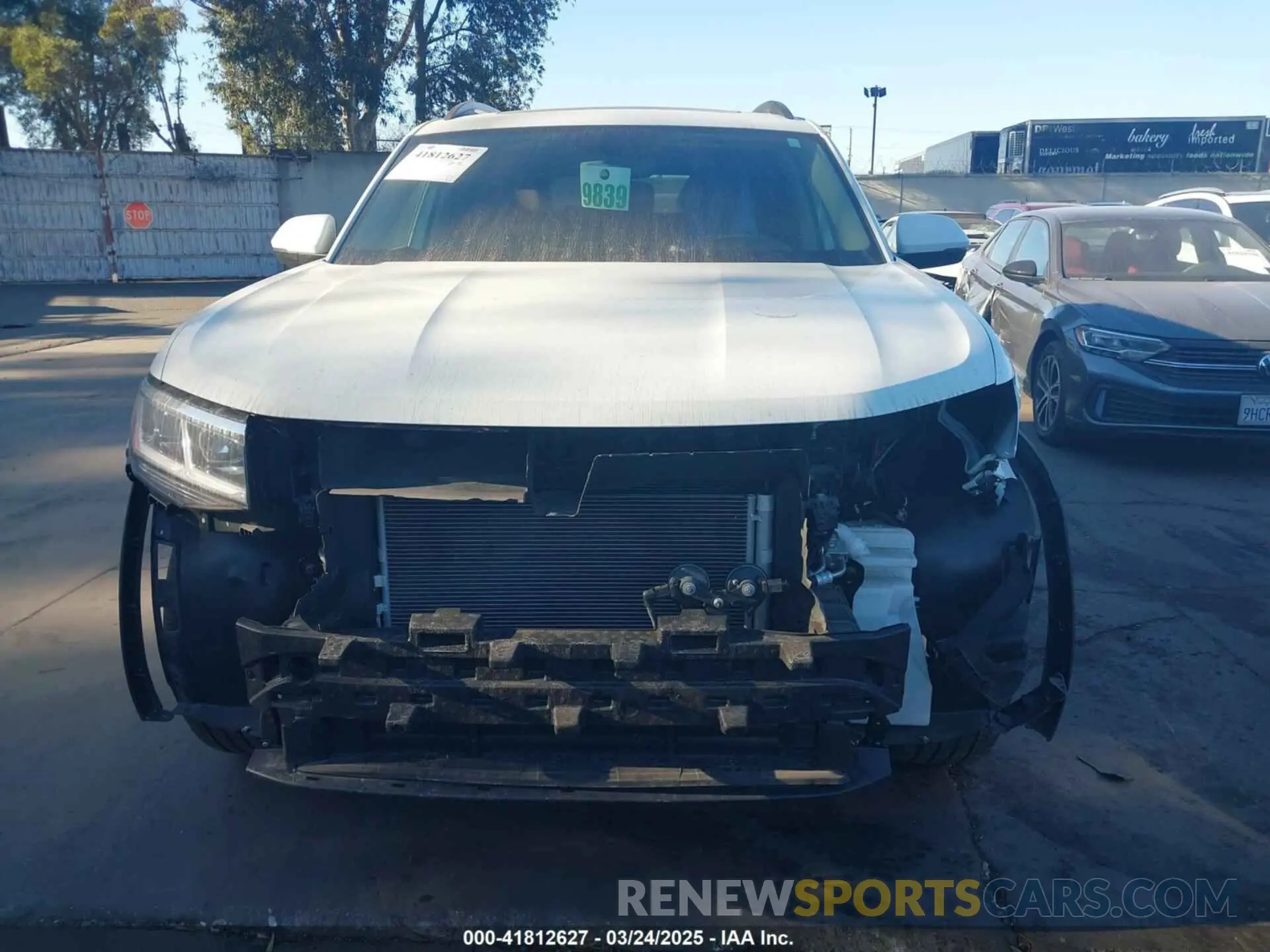 12 fotografías del automóvil dañado 1V2KP2CA6NC517277 VOLKSWAGEN ATLAS 2022