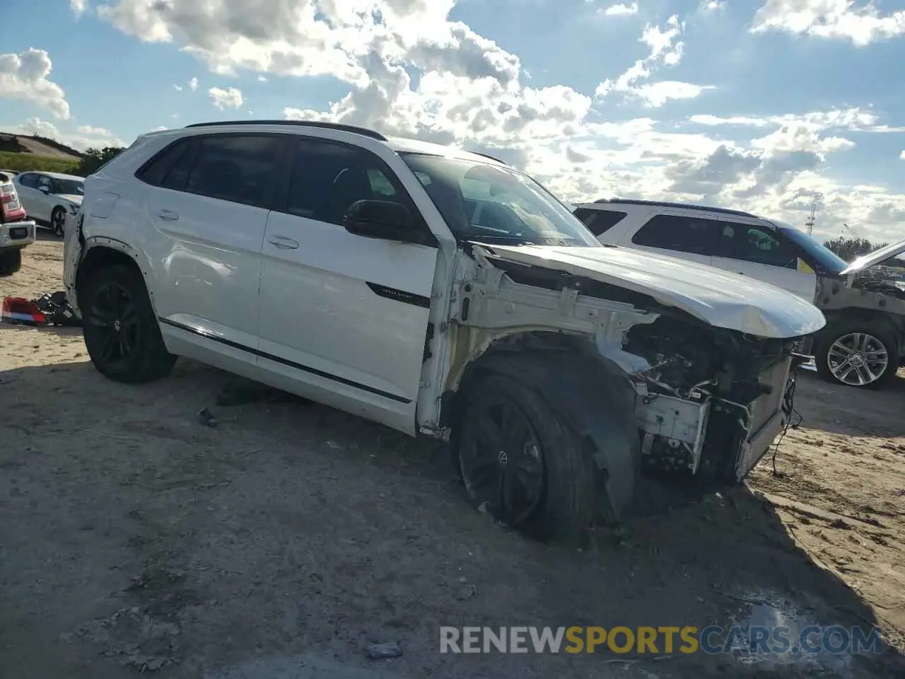 4 fotografías del automóvil dañado 1V2SE2CA4PC210229 VOLKSWAGEN ATLAS 2023