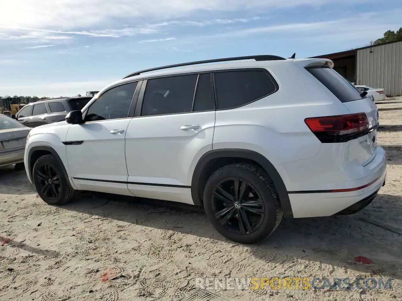 2 fotografías del automóvil dañado 1V2SR2CA0PC551521 VOLKSWAGEN ATLAS 2023