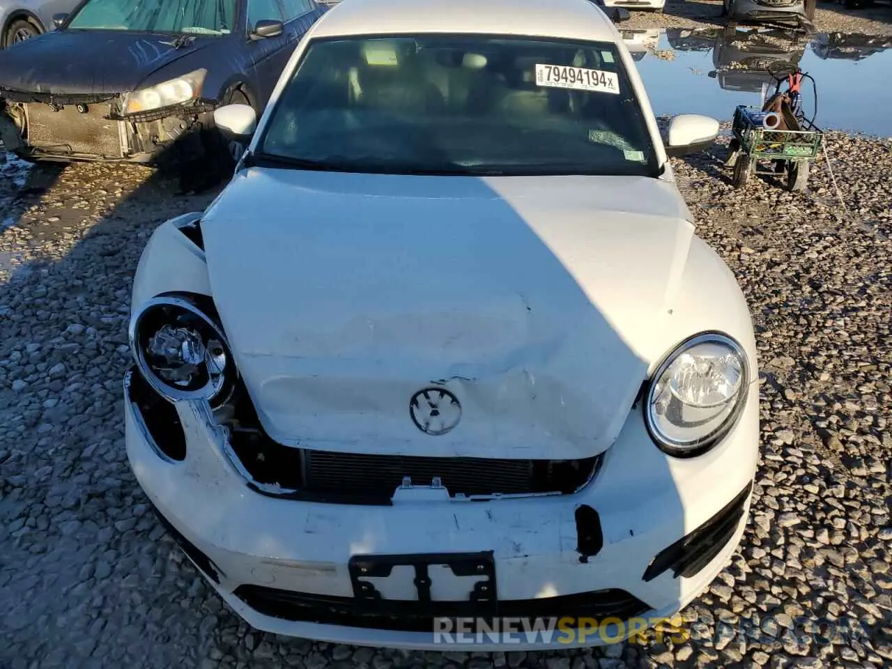 5 fotografías del automóvil dañado 3VWFD7AT7KM706430 VOLKSWAGEN BEETLE 2019