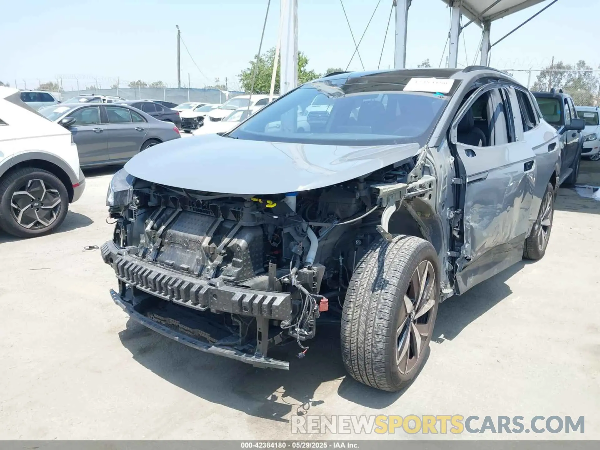2 fotografías del automóvil dañado 1V2WNPE88PC031961 VOLKSWAGEN ID.4 2023