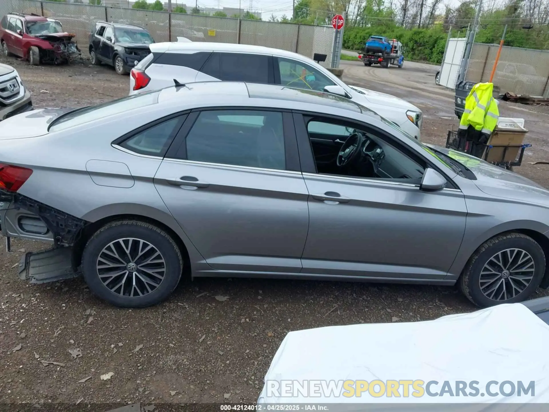 14 fotografías del automóvil dañado 3VWC57BU1KM169304 VOLKSWAGEN JETTA 2019