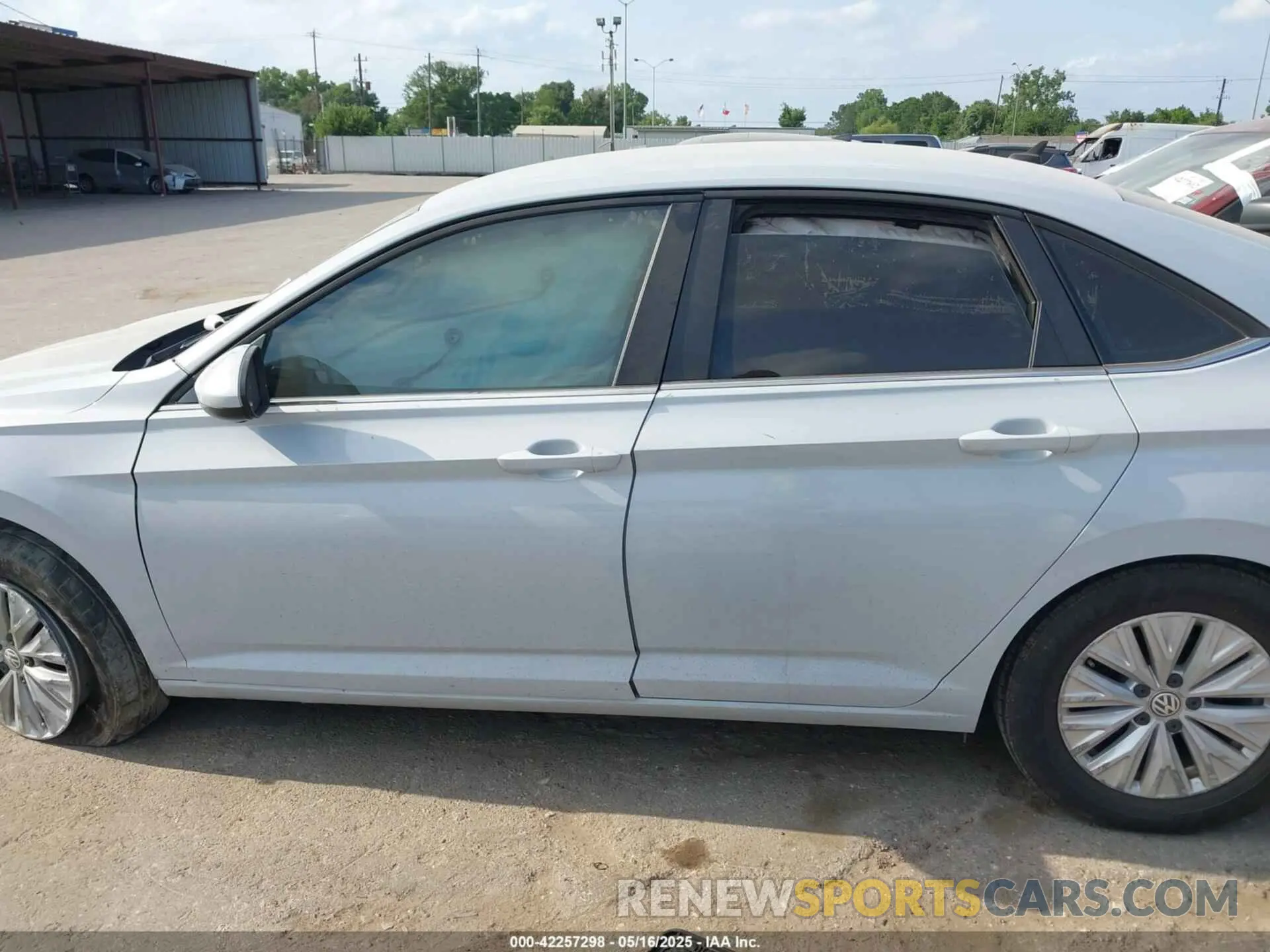 14 fotografías del automóvil dañado 3VWC57BU3KM089437 VOLKSWAGEN JETTA 2019