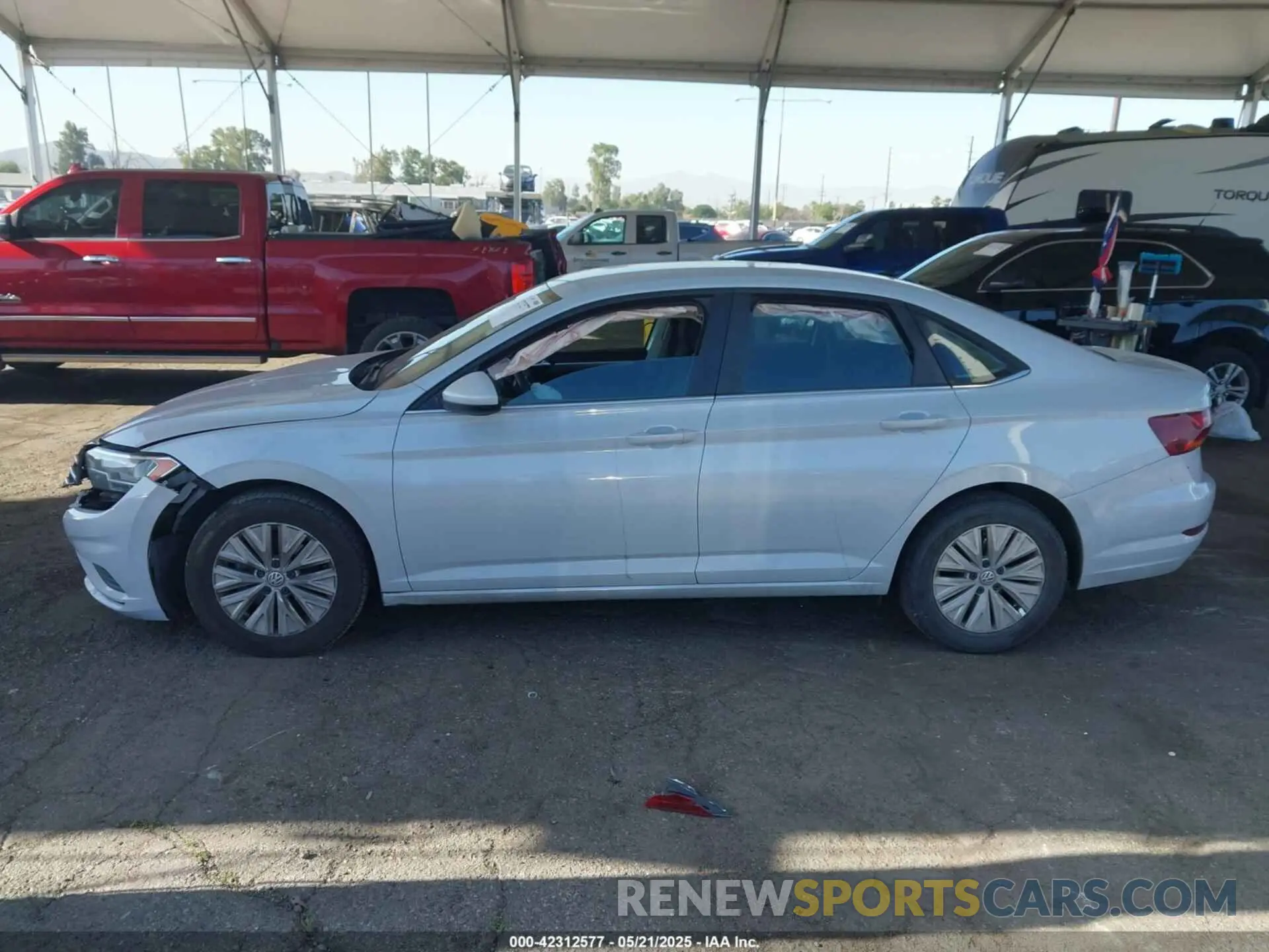 14 fotografías del automóvil dañado 3VWC57BU4KM074087 VOLKSWAGEN JETTA 2019