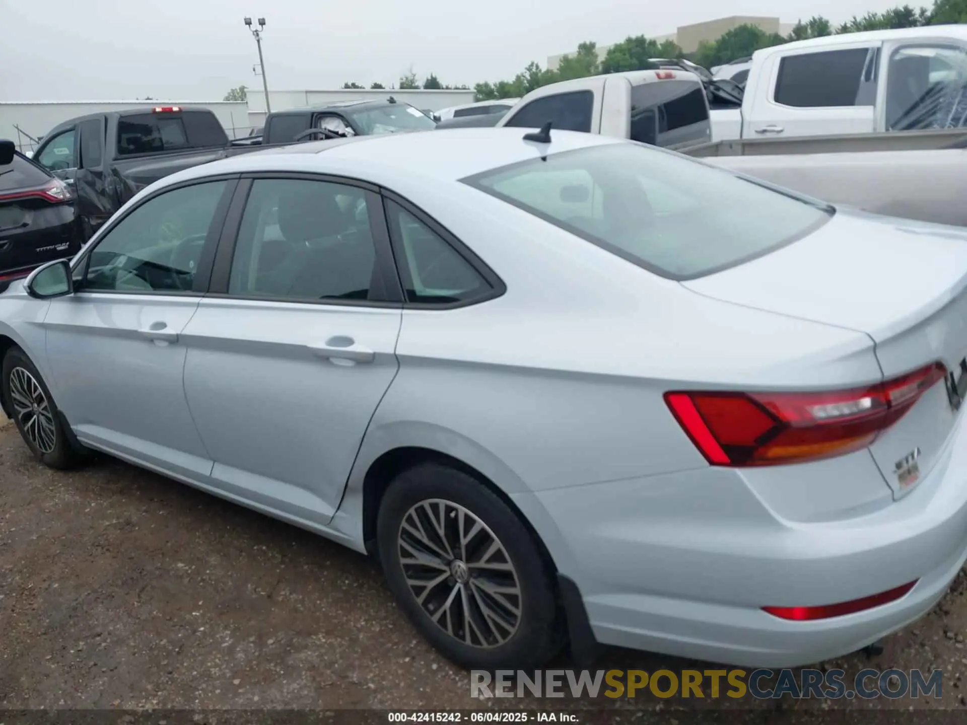 14 fotografías del automóvil dañado 3VWE57BU4KM038196 VOLKSWAGEN JETTA 2019