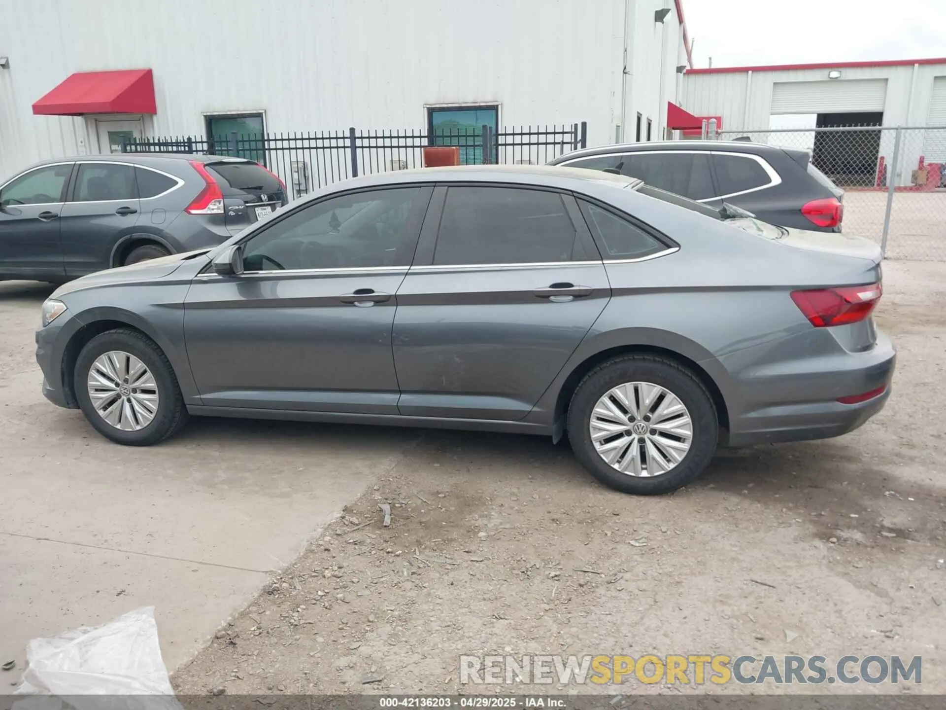 14 fotografías del automóvil dañado 3VWCB7BU7LM030563 VOLKSWAGEN JETTA 2020