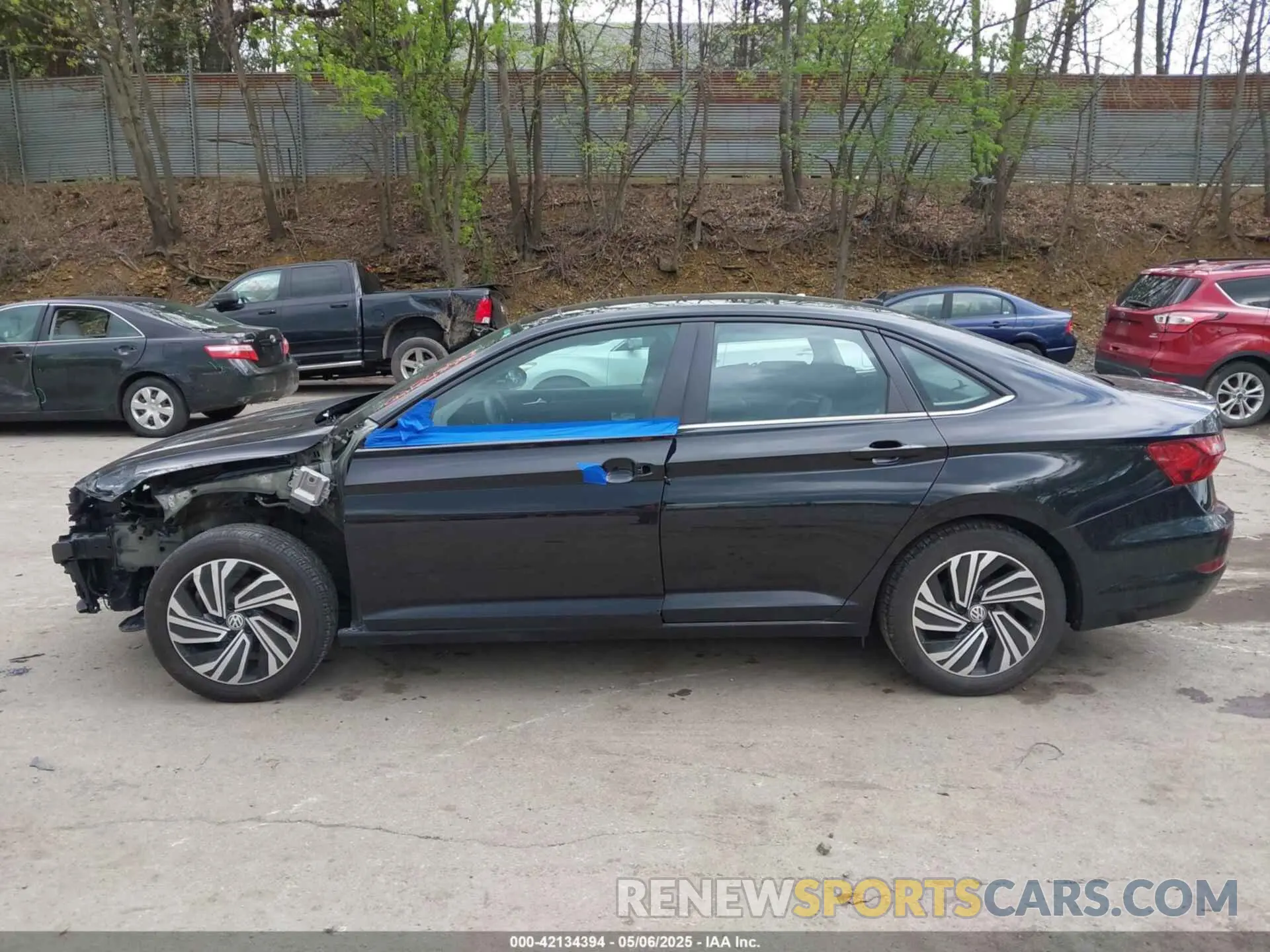 14 fotografías del automóvil dañado 3VWE57BU2LM081811 VOLKSWAGEN JETTA 2020