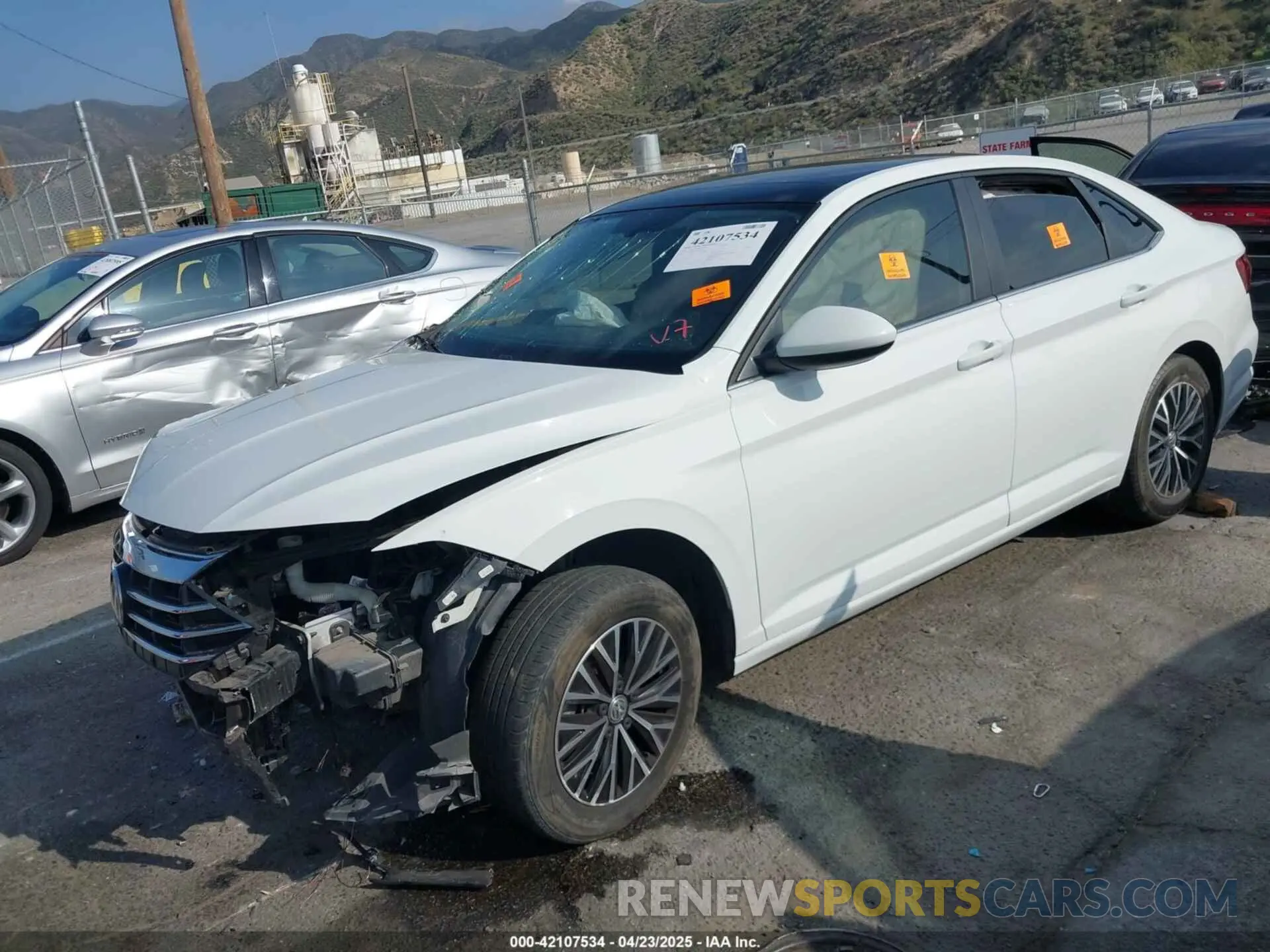 2 fotografías del automóvil dañado 3VWC57BU9MM036647 VOLKSWAGEN JETTA 2021