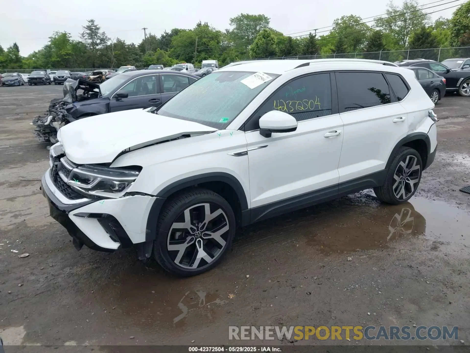 2 fotografías del automóvil dañado 3VVJX7B27NM022946 VOLKSWAGEN TAOS 2022