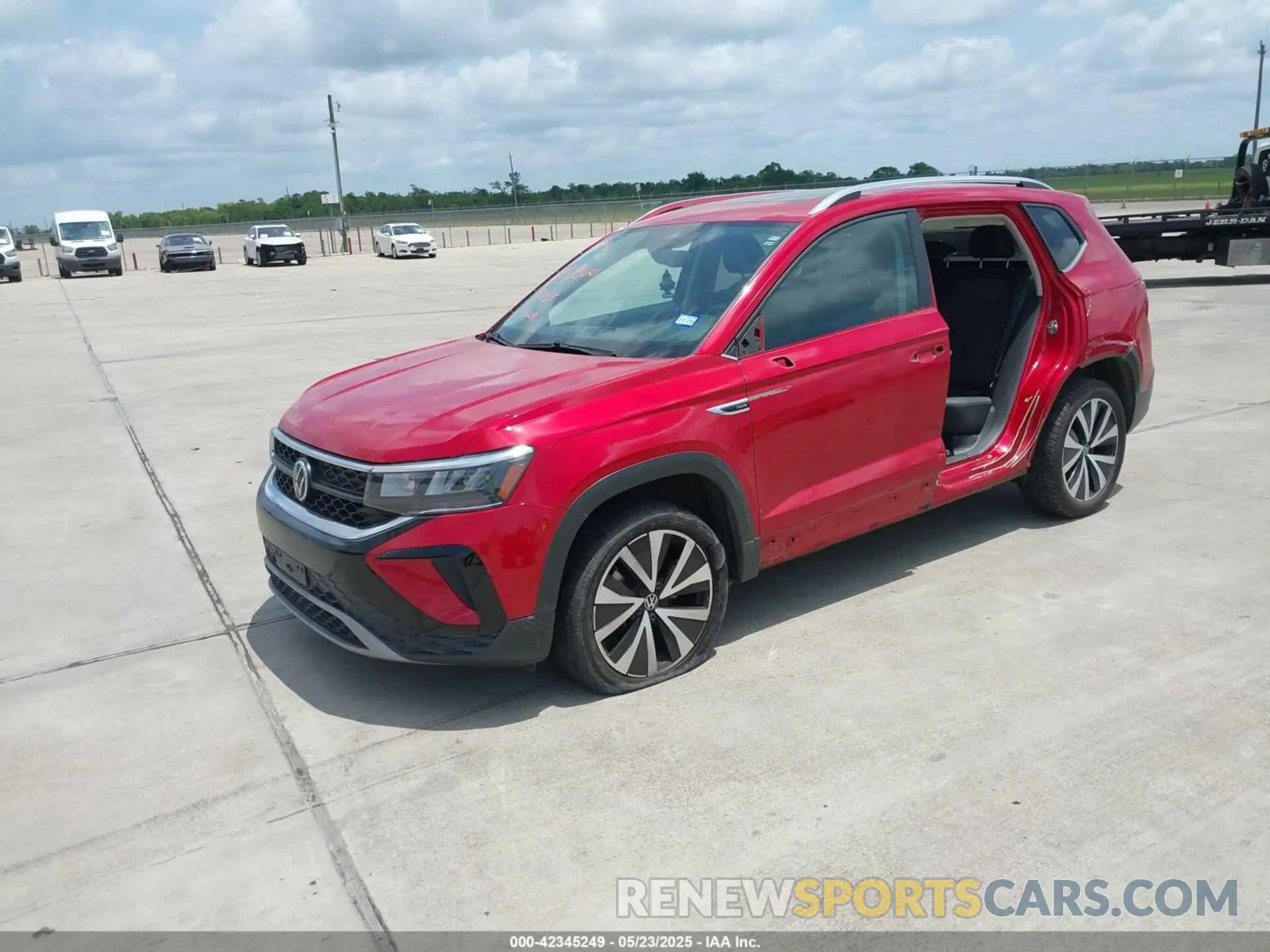 2 fotografías del automóvil dañado 3VVLX7B29NM038915 VOLKSWAGEN TAOS 2022
