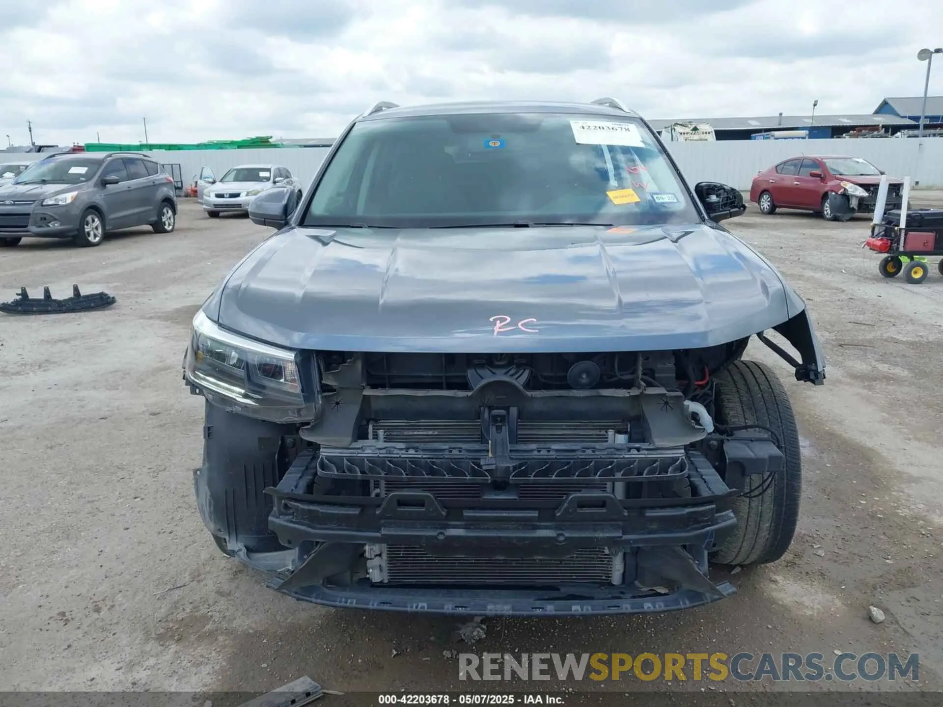 12 fotografías del automóvil dañado 3VVRX7B22NM036448 VOLKSWAGEN TAOS 2022