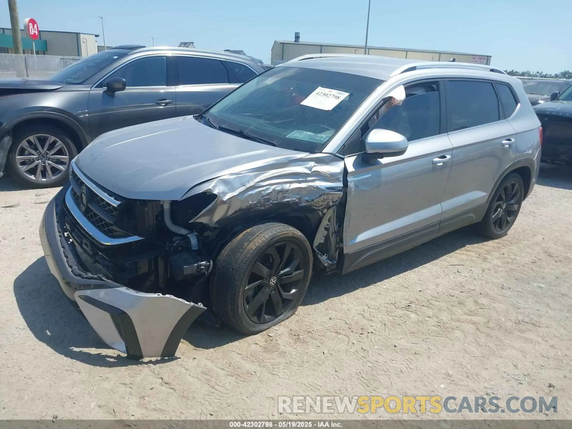 2 fotografías del automóvil dañado 3VVRX7B29NM092290 VOLKSWAGEN TAOS 2022