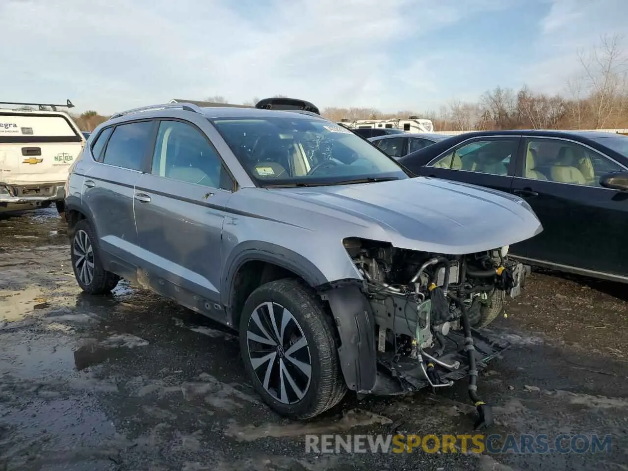 4 fotografías del automóvil dañado 3VVEX7B2XPM349443 VOLKSWAGEN TAOS SE 2023