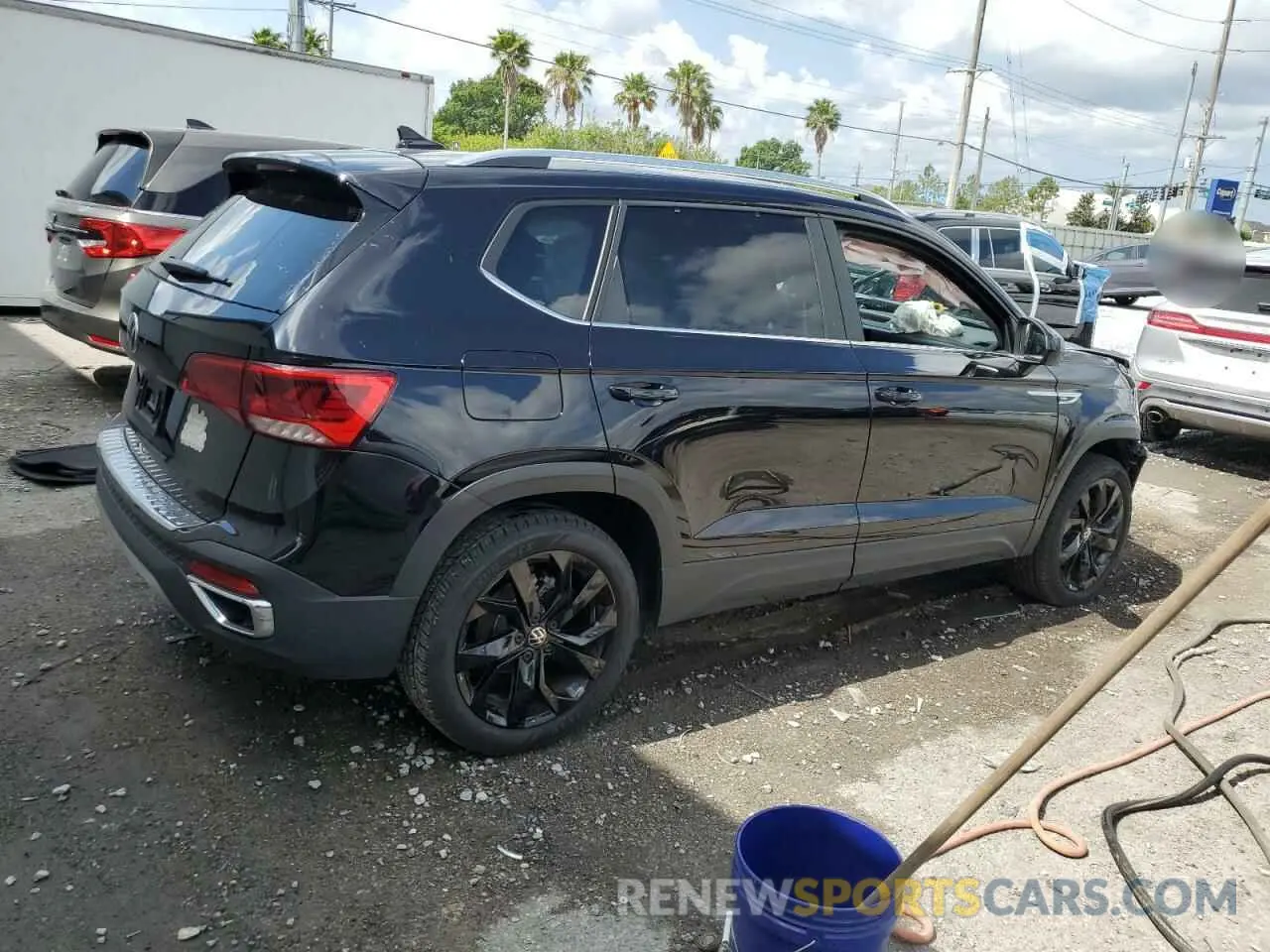 3 fotografías del automóvil dañado 3VVSX7B29PM311270 VOLKSWAGEN TAOS SE 2023
