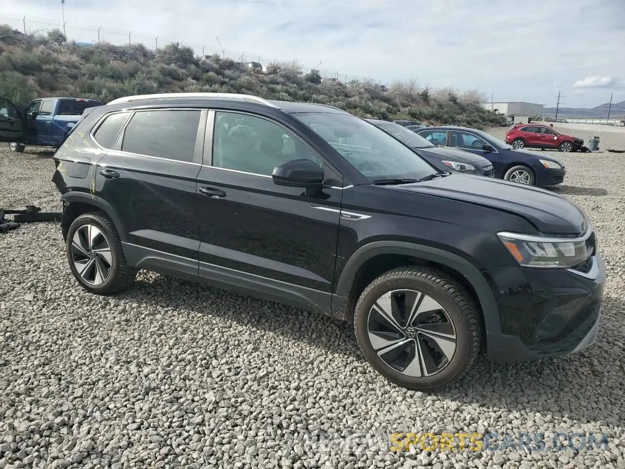 4 fotografías del automóvil dañado 3VVVX7B28PM358321 VOLKSWAGEN TAOS SE 2023