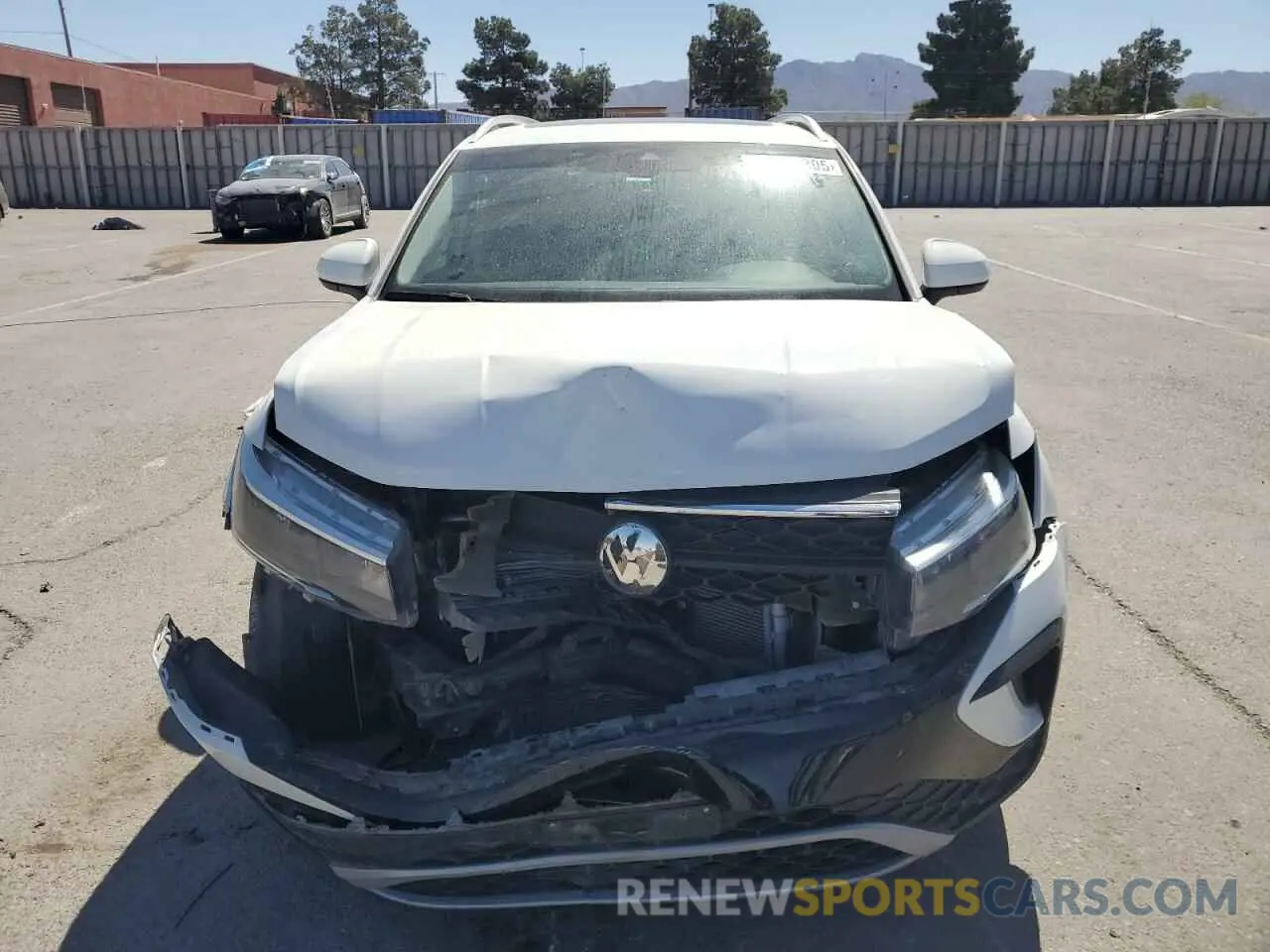5 fotografías del automóvil dañado 3VVLX7B27NM023975 VOLKSWAGEN TAOS SE IQ 2022