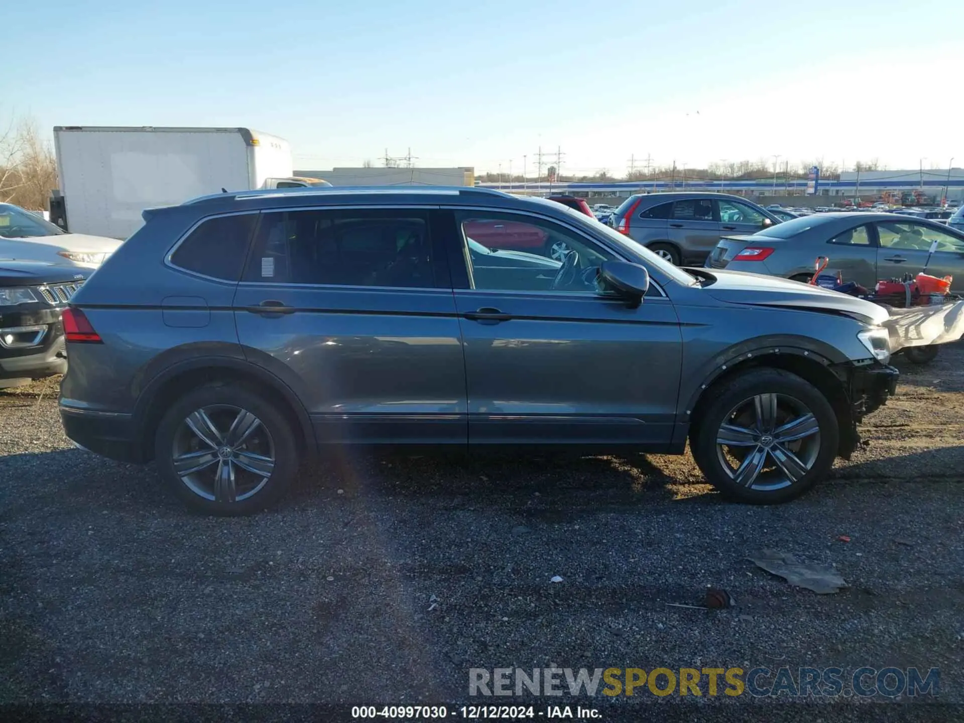 14 fotografías del automóvil dañado 3VV2B7AXXLM025353 VOLKSWAGEN TIGUAN 2020