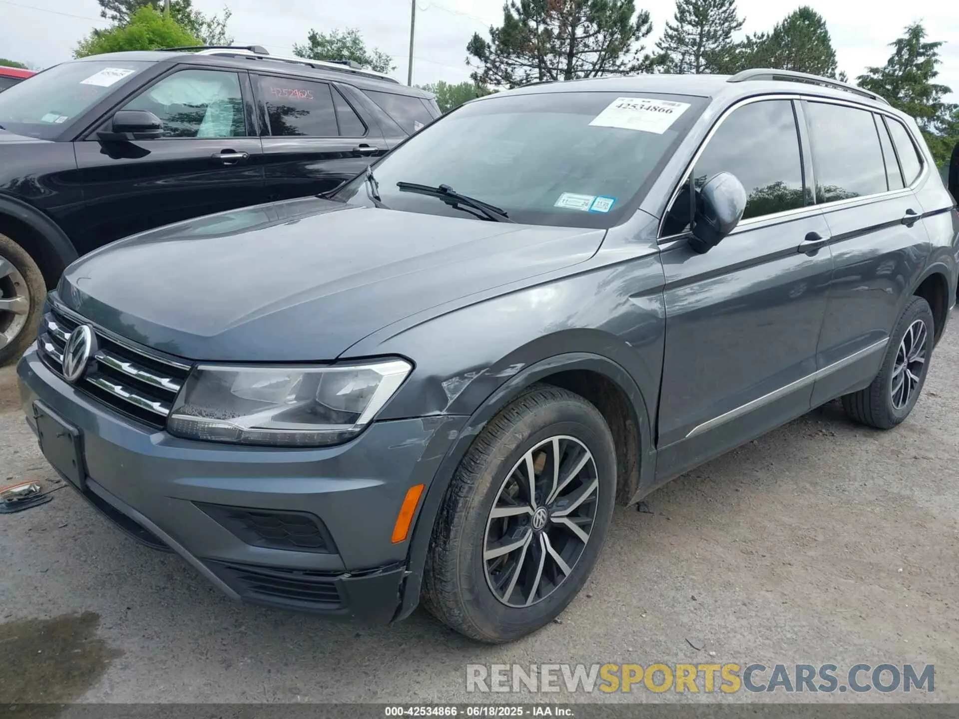 2 fotografías del automóvil dañado 3VV2B7AX4MM083136 VOLKSWAGEN TIGUAN 2021
