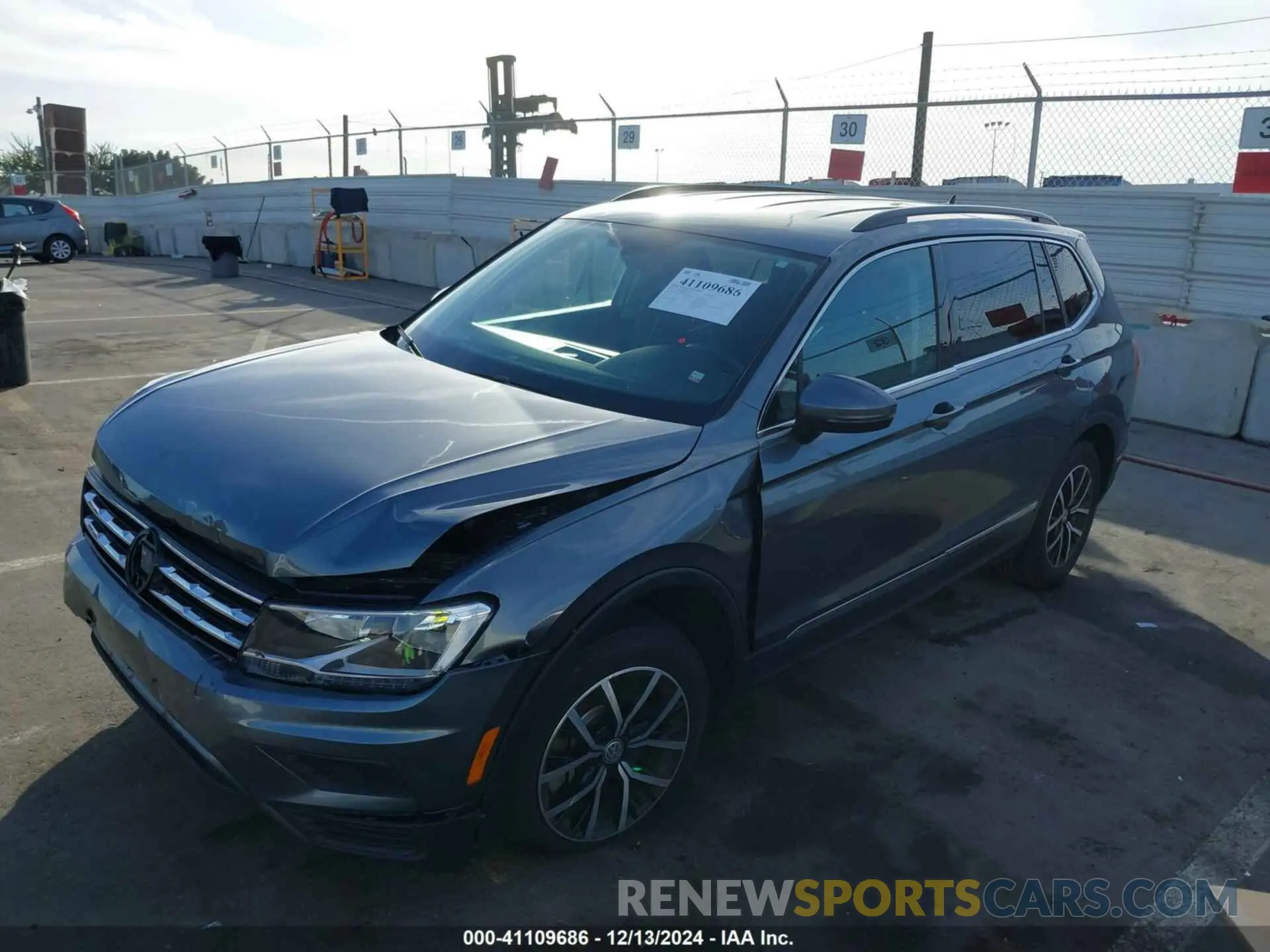 2 fotografías del automóvil dañado 3VV3B7AX8MM071303 VOLKSWAGEN TIGUAN 2021