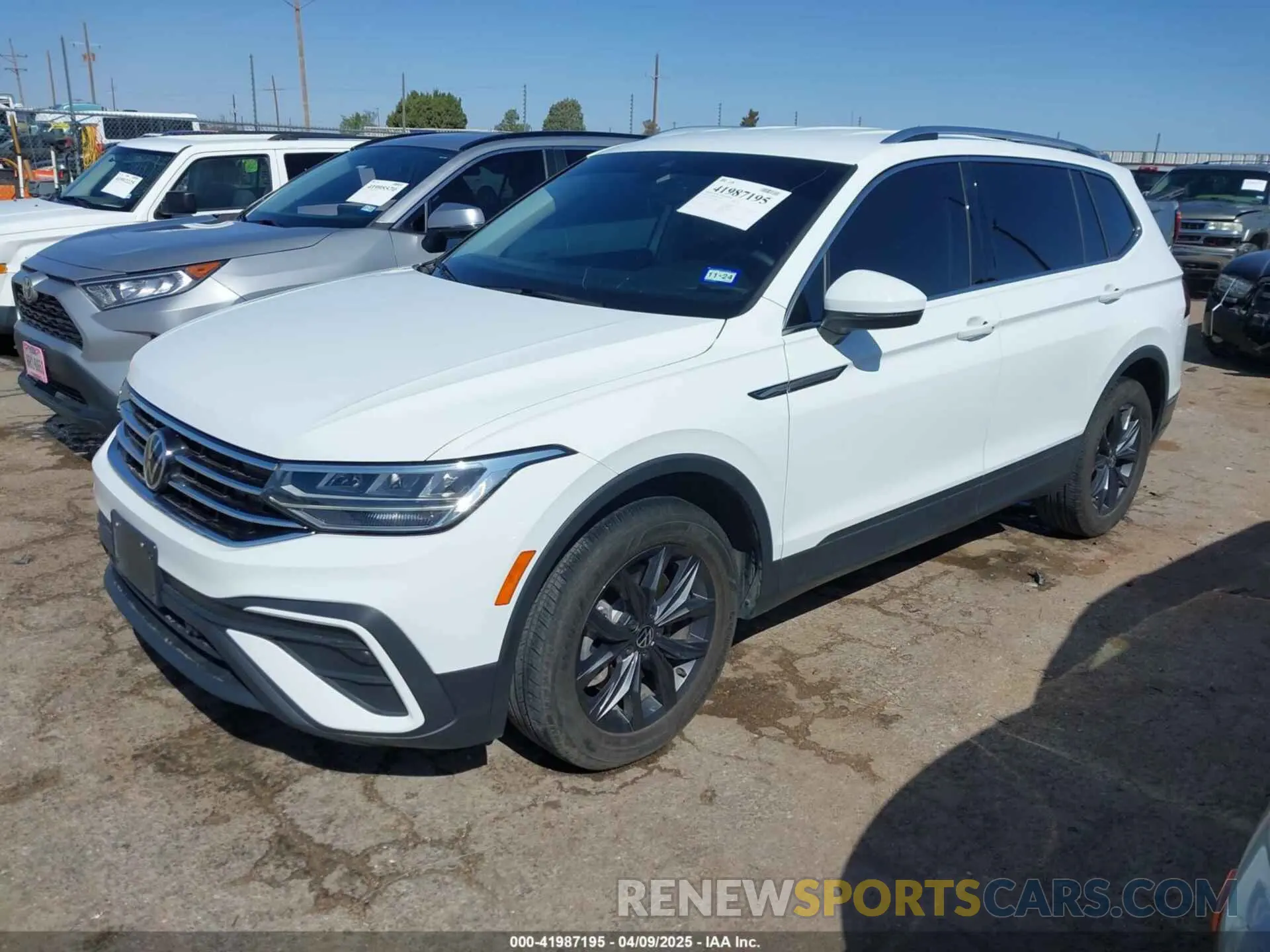 2 fotografías del automóvil dañado 3VV3B7AX8NM025052 VOLKSWAGEN TIGUAN 2022
