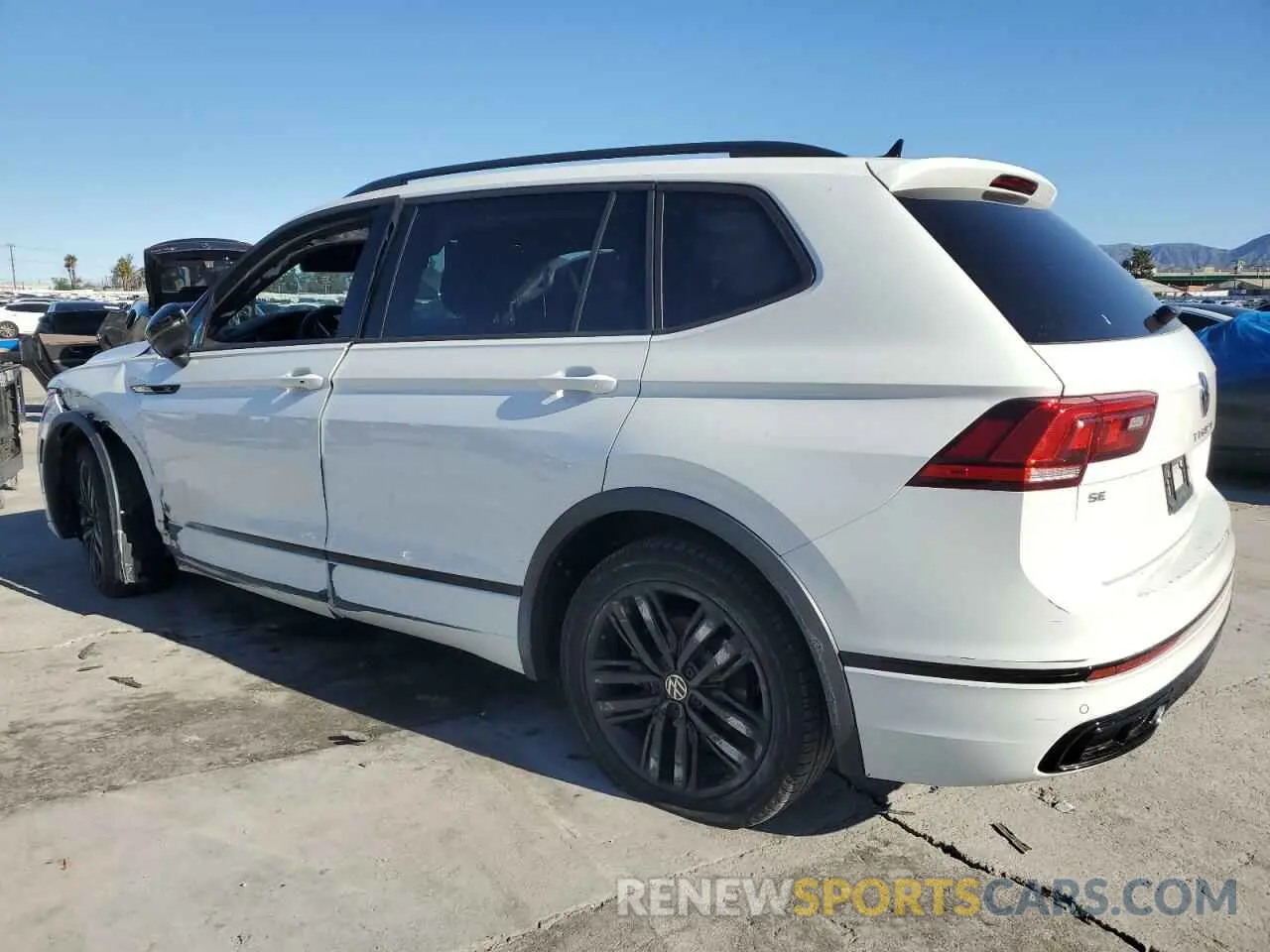 2 fotografías del automóvil dañado 3VVCB7AX0NM095371 VOLKSWAGEN TIGUAN 2022