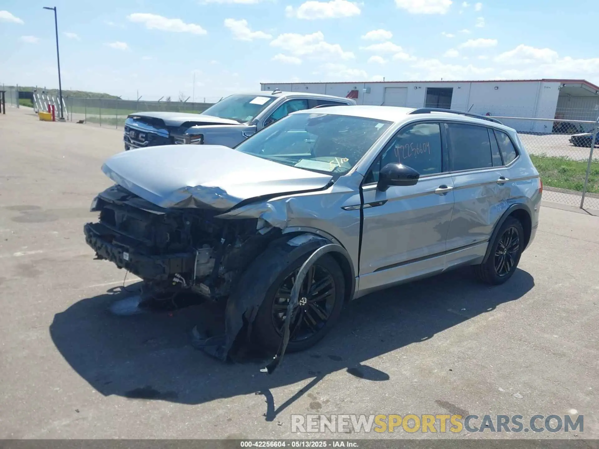 2 fotografías del automóvil dañado 3VVCB7AX2NM003645 VOLKSWAGEN TIGUAN 2022