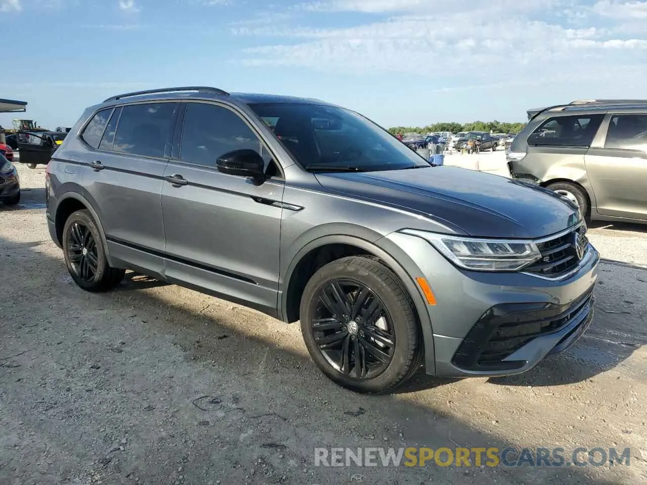 4 fotografías del automóvil dañado 3VVCB7AX2NM063439 VOLKSWAGEN TIGUAN 2022