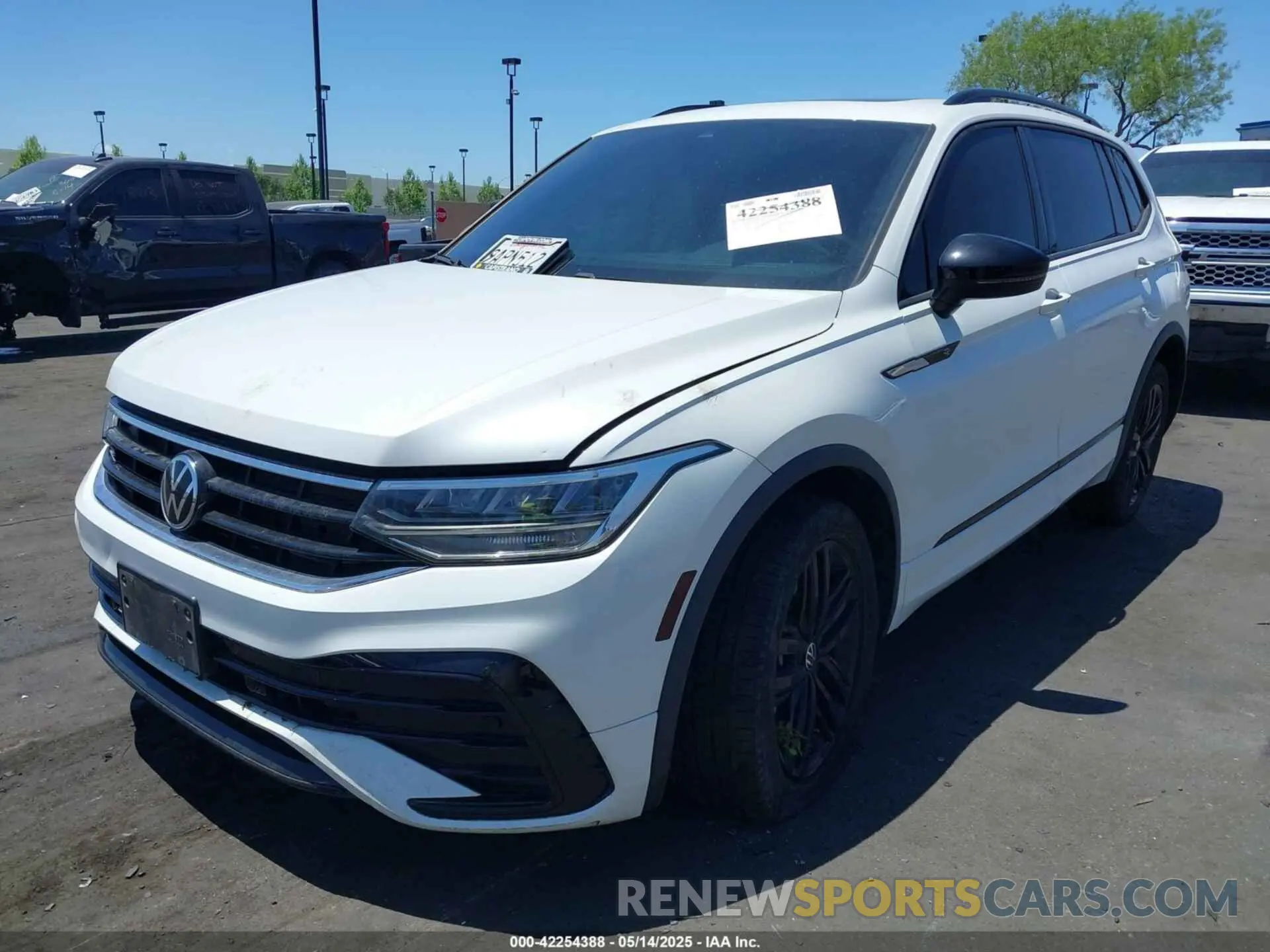 2 fotografías del automóvil dañado 3VVCB7AX3NM073218 VOLKSWAGEN TIGUAN 2022