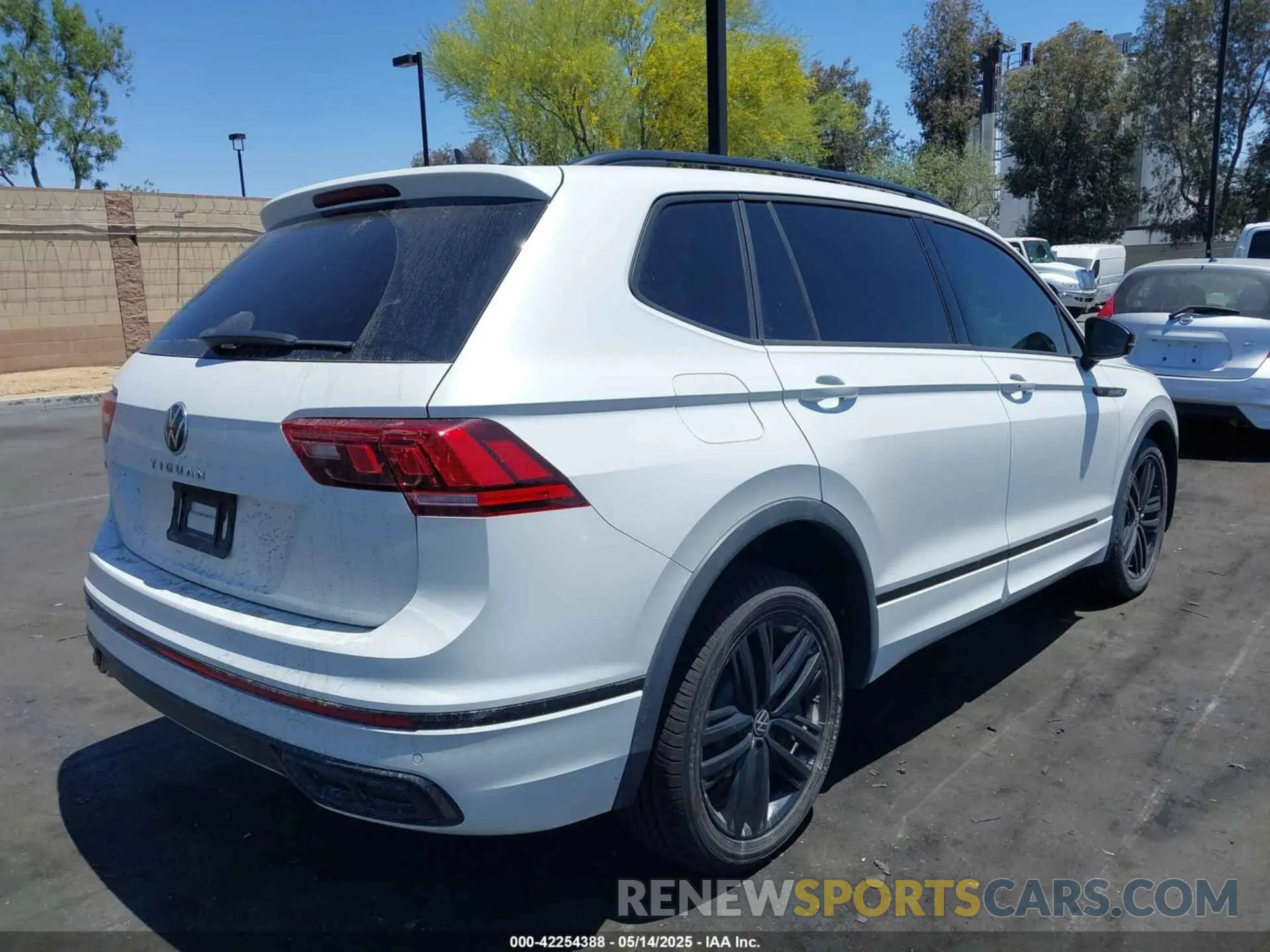 4 fotografías del automóvil dañado 3VVCB7AX3NM073218 VOLKSWAGEN TIGUAN 2022