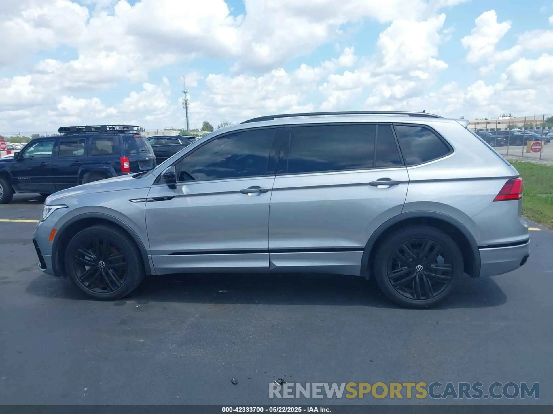 14 fotografías del automóvil dañado 3VVCB7AX5NM063130 VOLKSWAGEN TIGUAN 2022