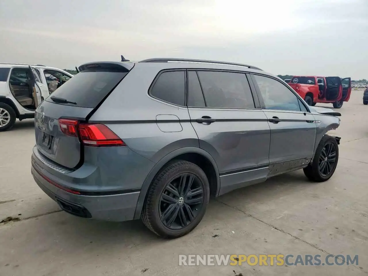3 fotografías del automóvil dañado 3VVCB7AXXNM113777 VOLKSWAGEN TIGUAN 2022