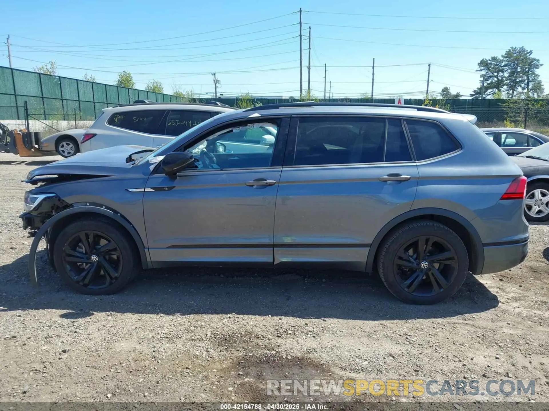 14 fotografías del automóvil dañado 3VV8B7AX7PM102793 VOLKSWAGEN TIGUAN 2023