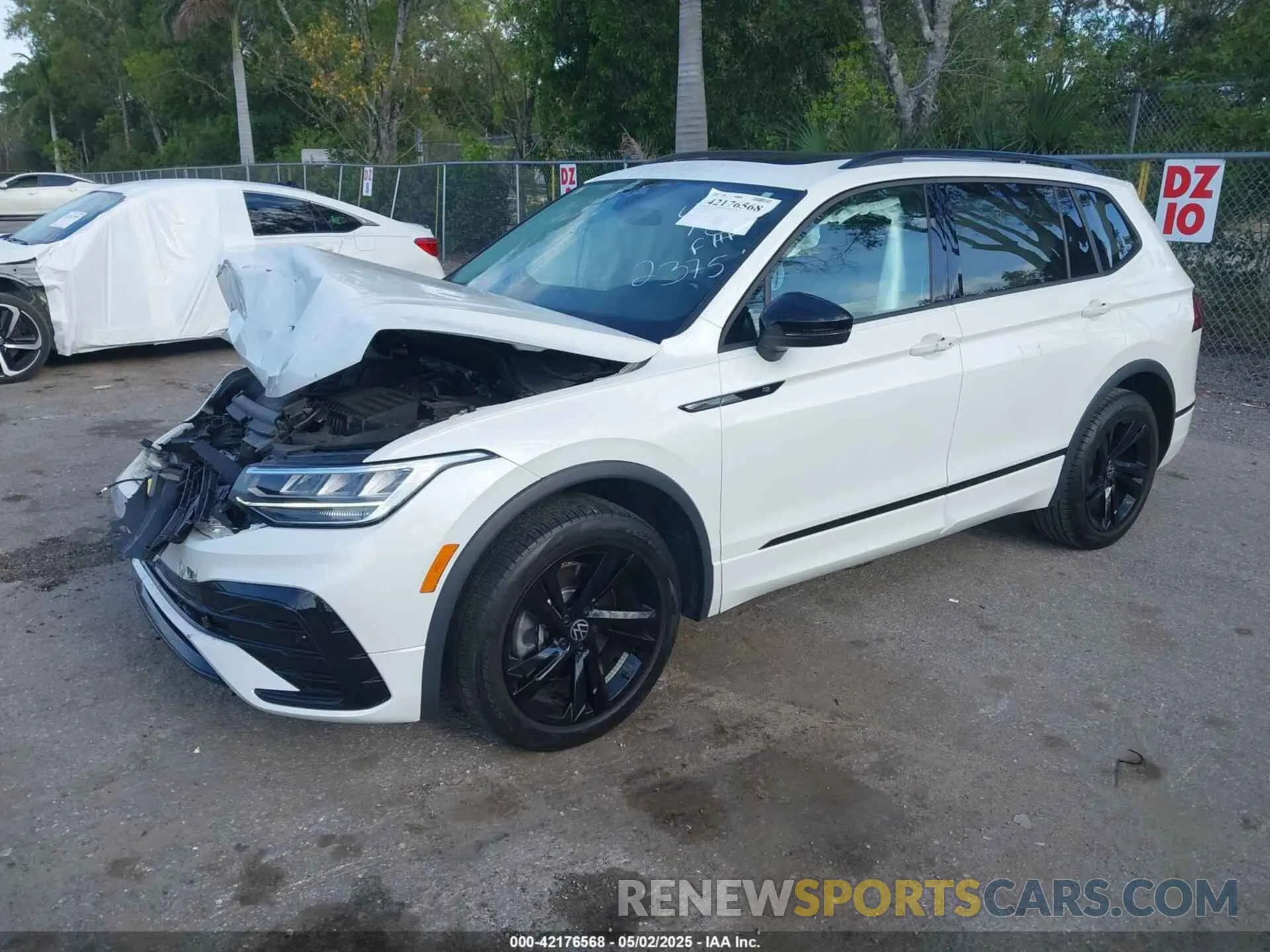 2 fotografías del automóvil dañado 3VVCB7AX0PM092375 VOLKSWAGEN TIGUAN 2023
