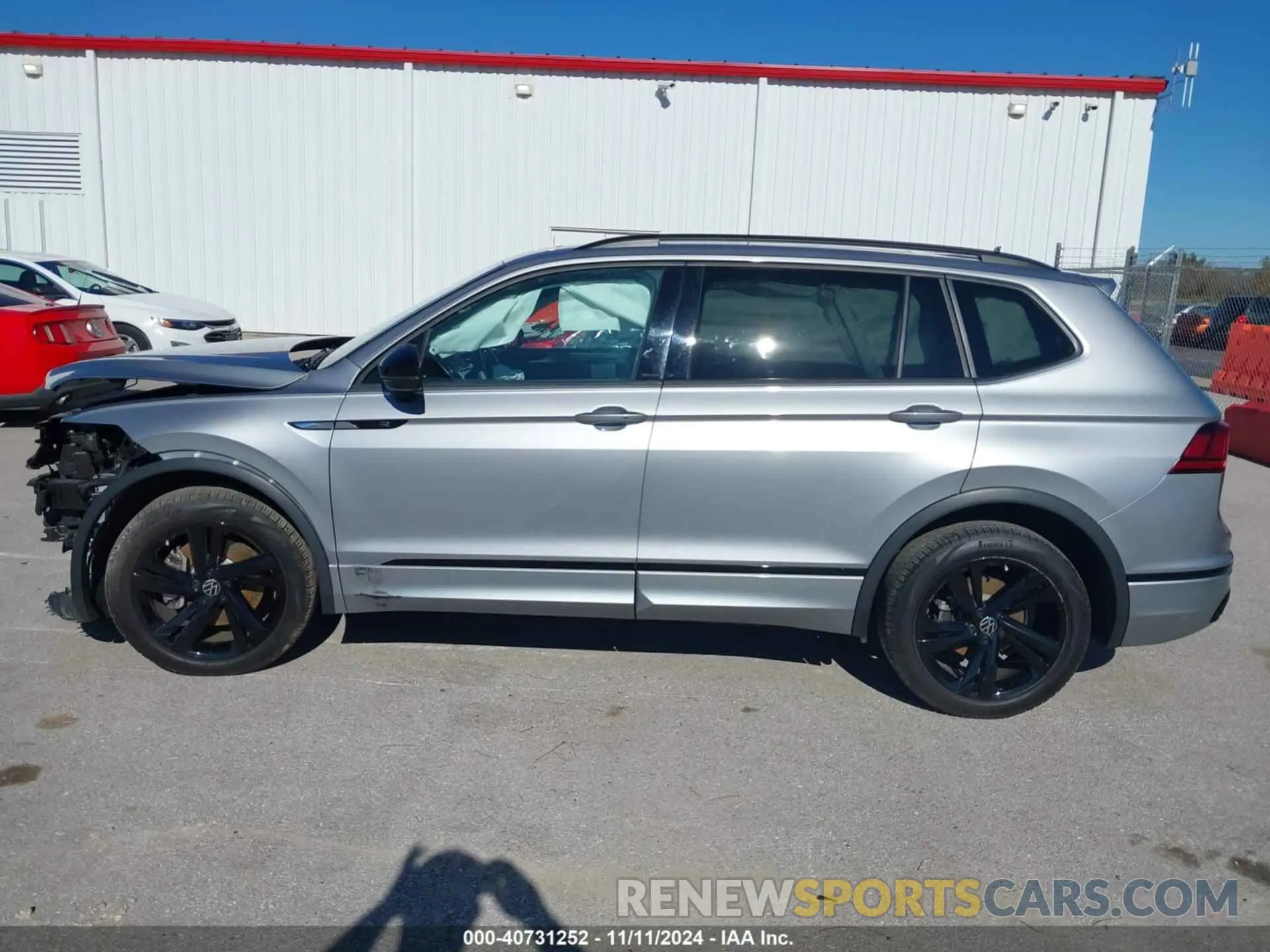 14 fotografías del automóvil dañado 3VVCB7AX7PM137019 VOLKSWAGEN TIGUAN 2023