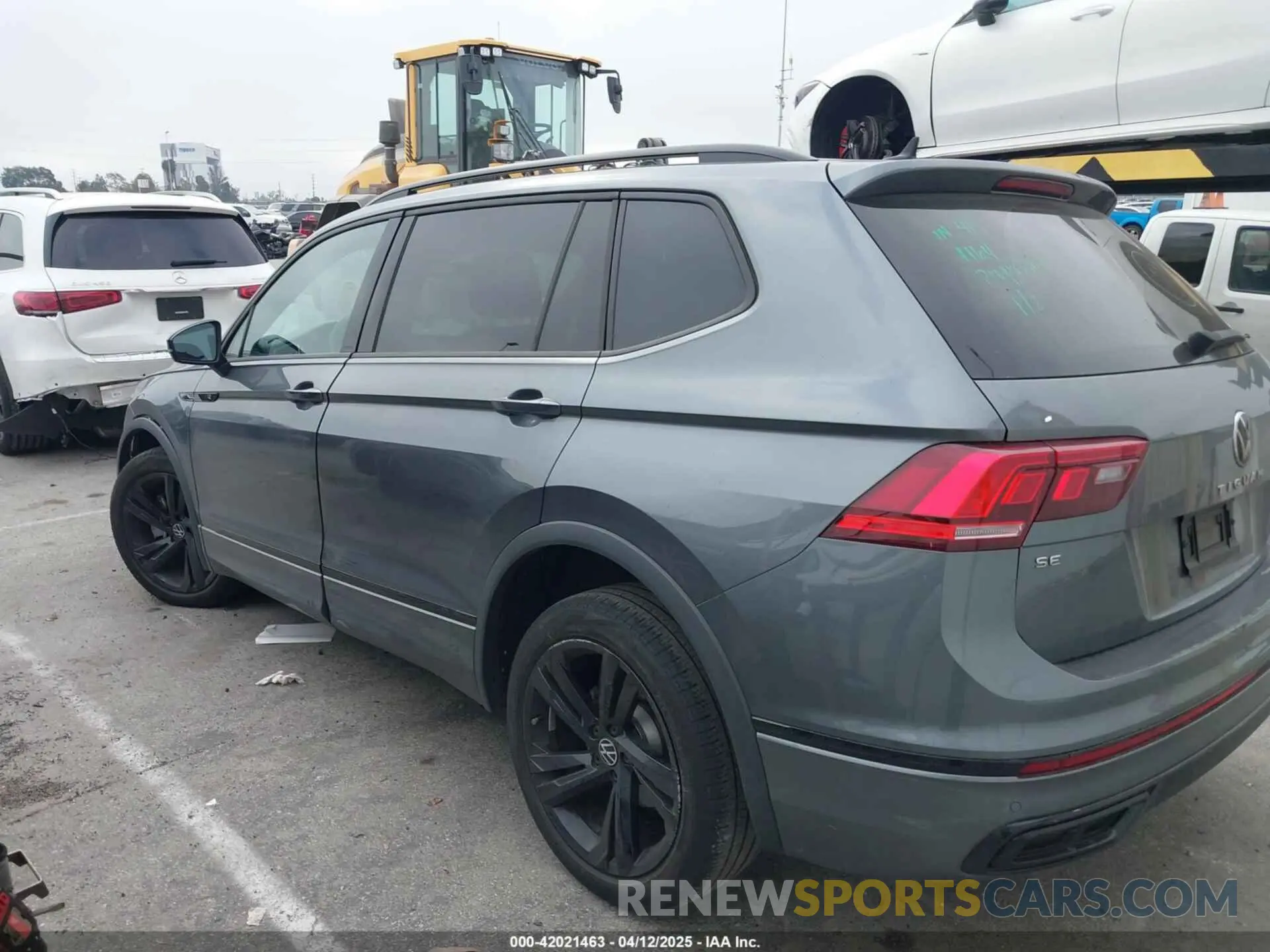 14 fotografías del automóvil dañado 3VVCB7AX8PM040458 VOLKSWAGEN TIGUAN 2023
